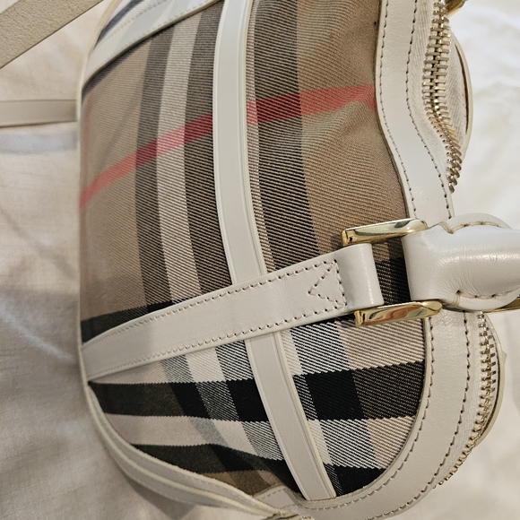 Burberry is a little over-sized crossbody with a top handle bag. Rarely used. - Picture 4 of 7